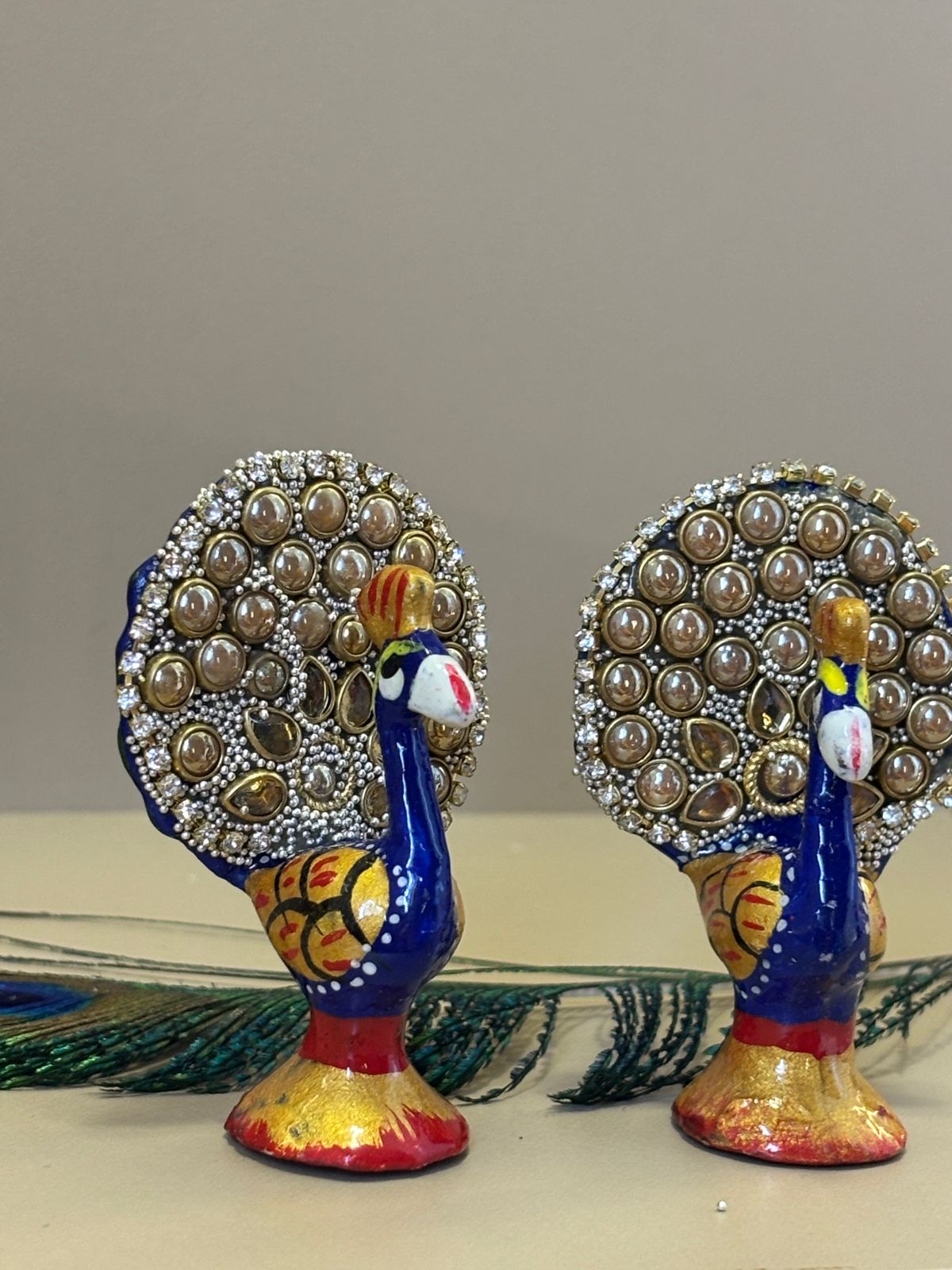 Kri-Radhey Kundan work metal peacock