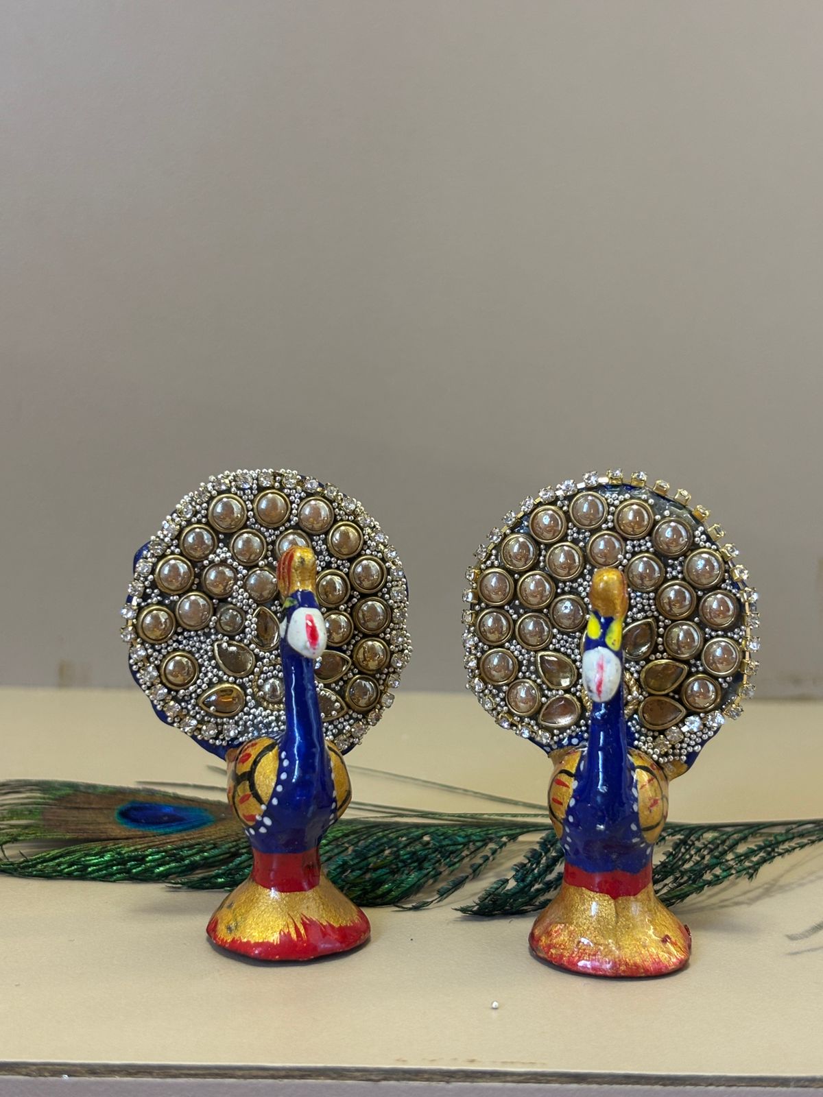Kri-Radhey Kundan work metal peacock