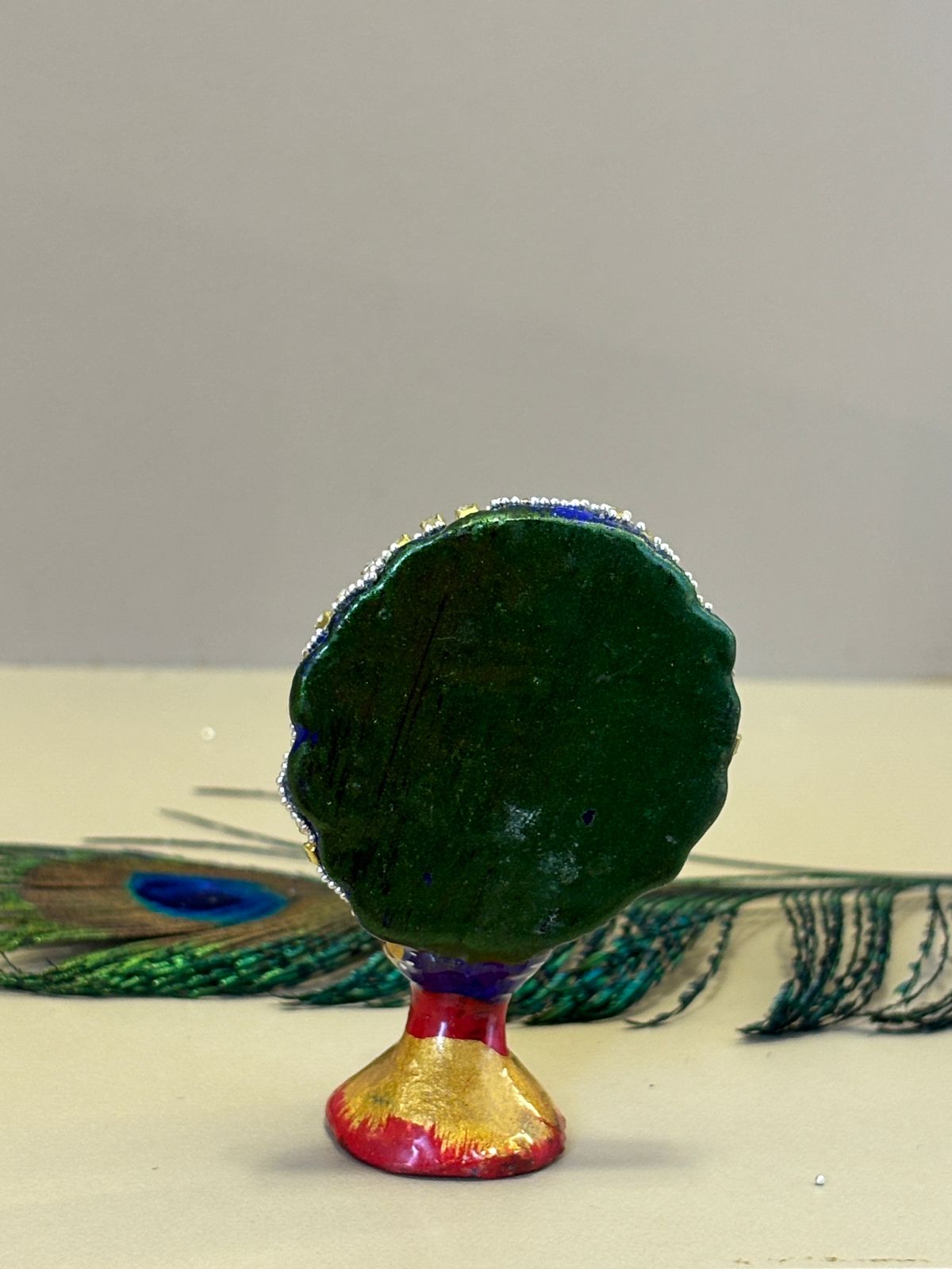 Kri-Radhey Kundan work metal peacock